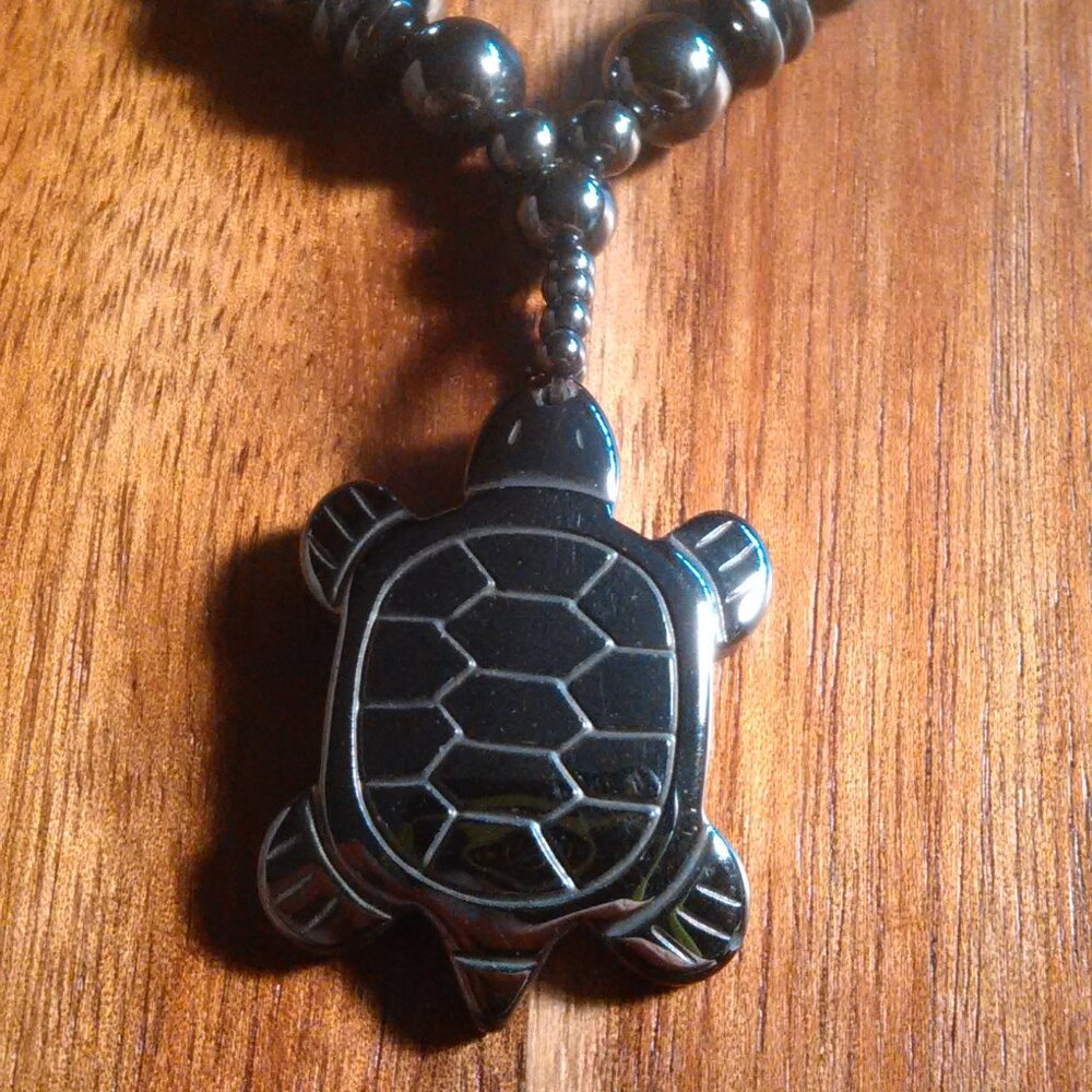 Turtle Charm And Beaded Hematite Necklace